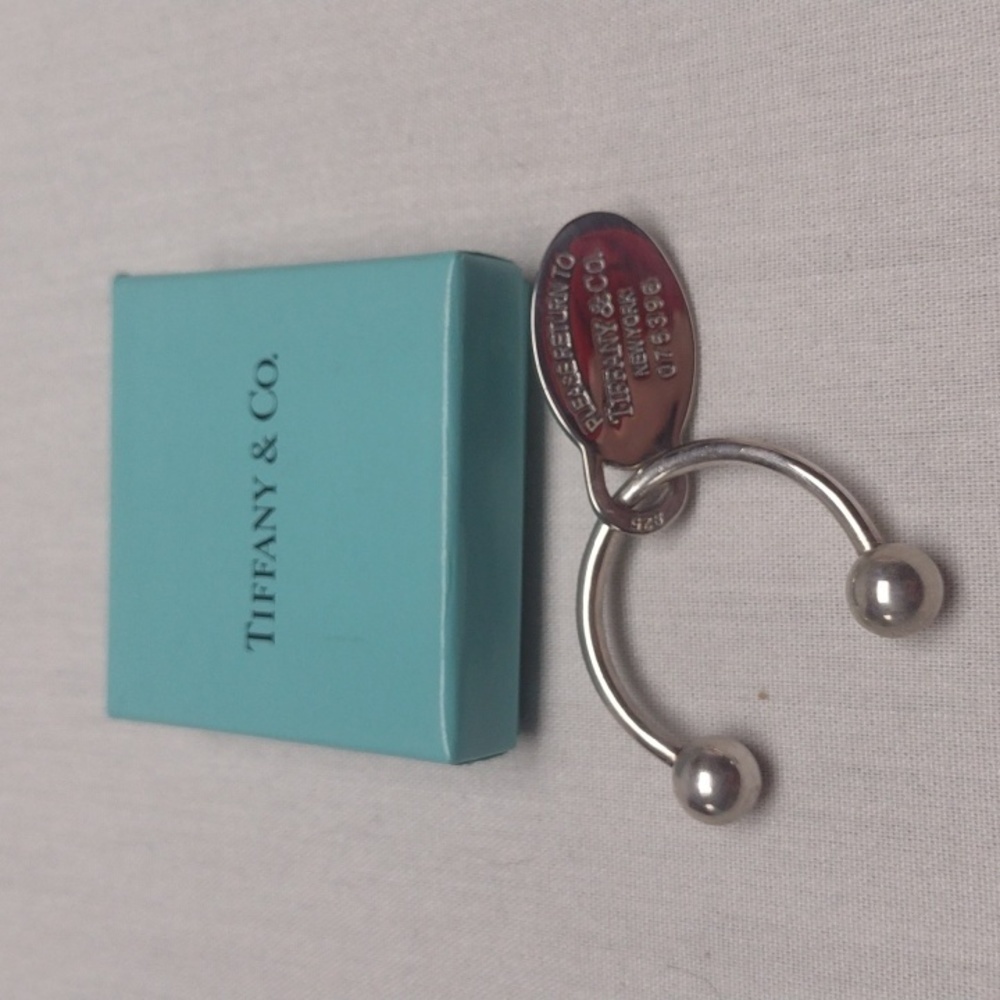 Tiffany & Co. Sterling Silver Horseshoe Key Ring With Dangling Oval Charm